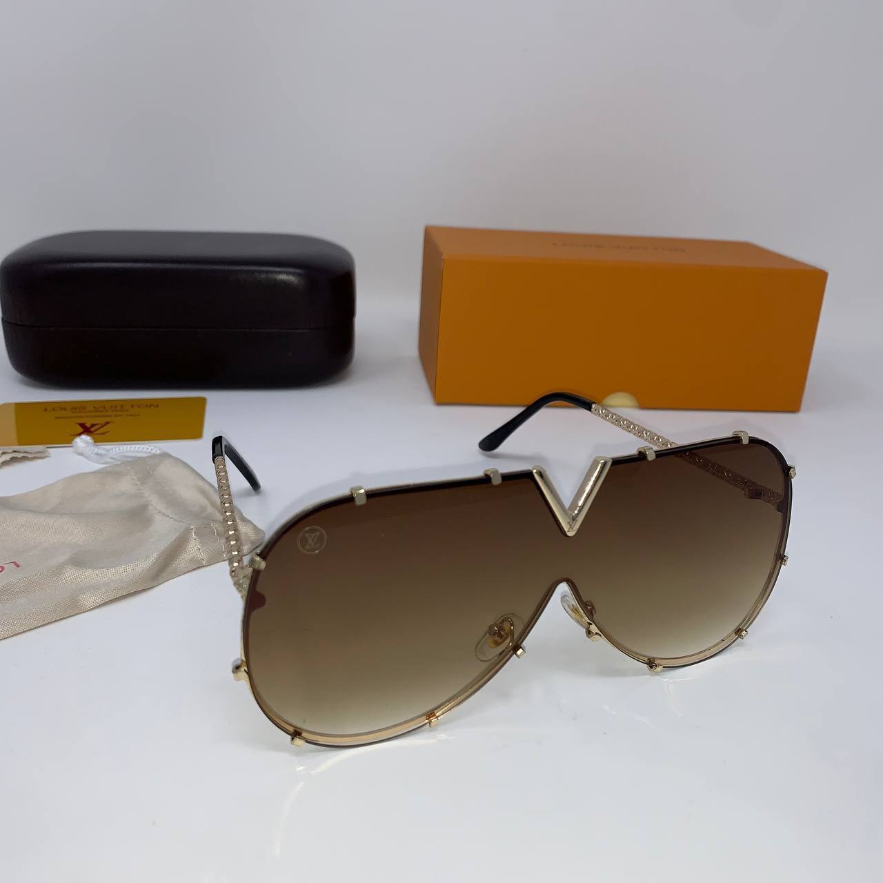 photo 5816801731306786411 y Louis Vuitton LV Drive brown metal AAA replica sunglasses UK — men's women's designer reps sale