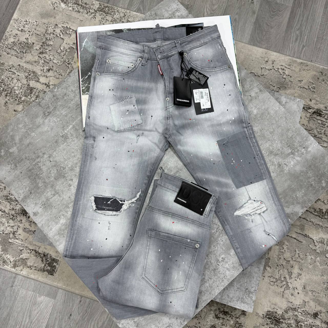 photo 5821087451538199410 y Dsquared2 patched denim slim fit distressed light grey AAA replica jeans UK designer reps sale