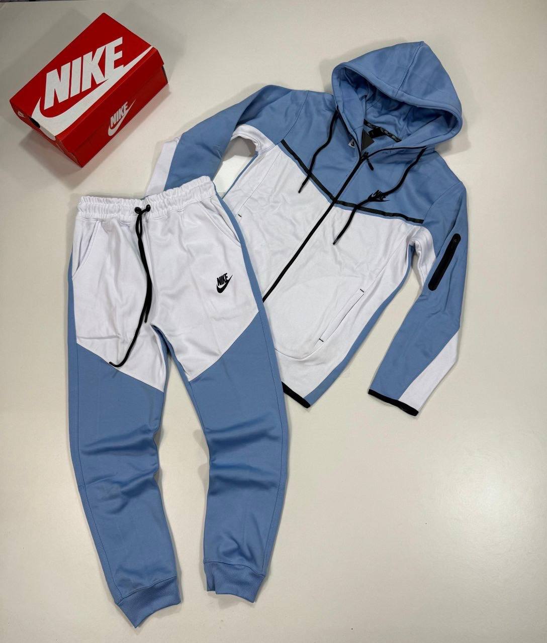 photo 5825510636492885690 y Nike Tech Fleece Signature tracksuit blue white men's AAA replica UK - designer reps sale