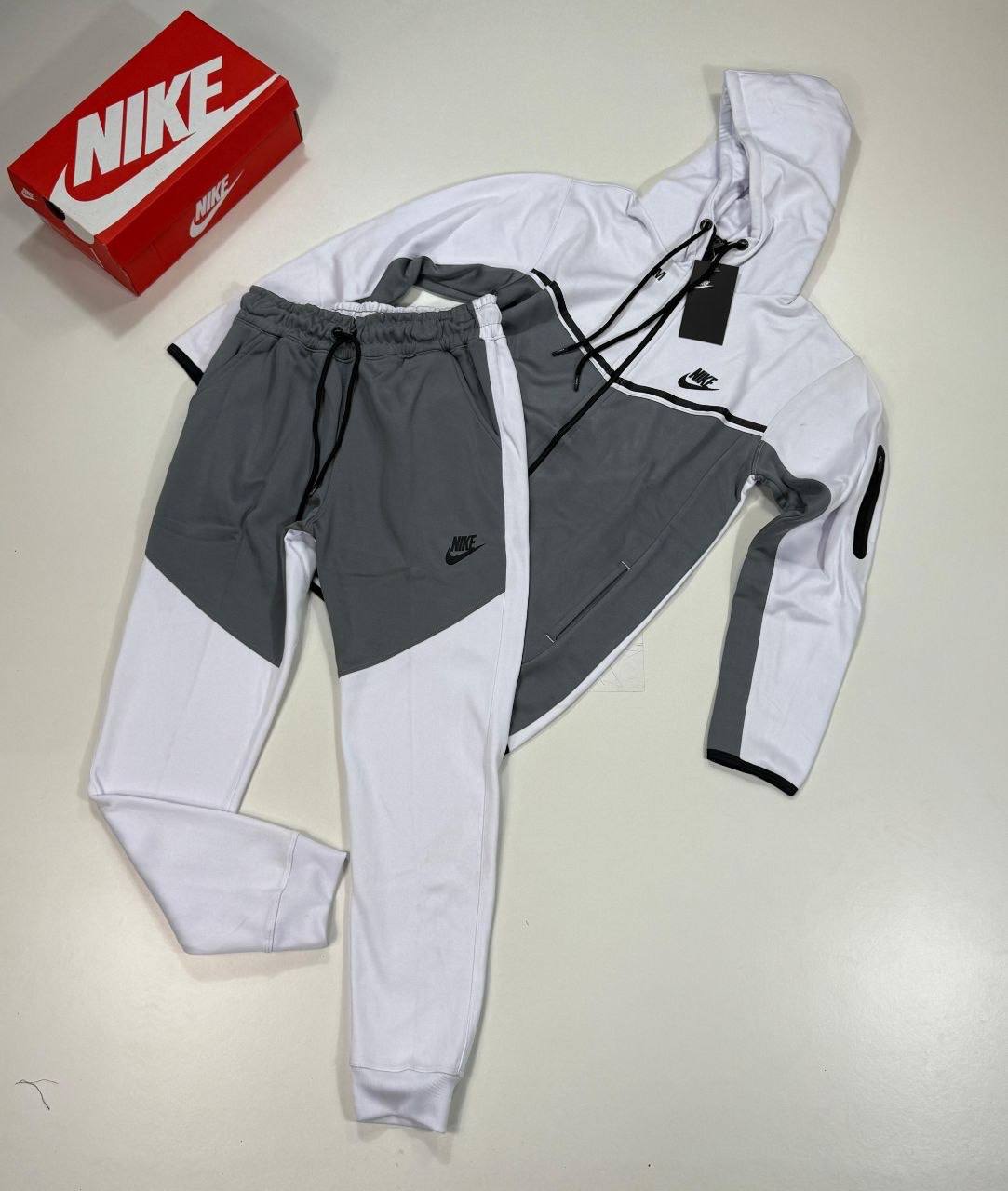 photo 5825510636492885692 y Nike Tech Fleece Signature tracksuit white grey men's AAA replica UK - designer reps sale