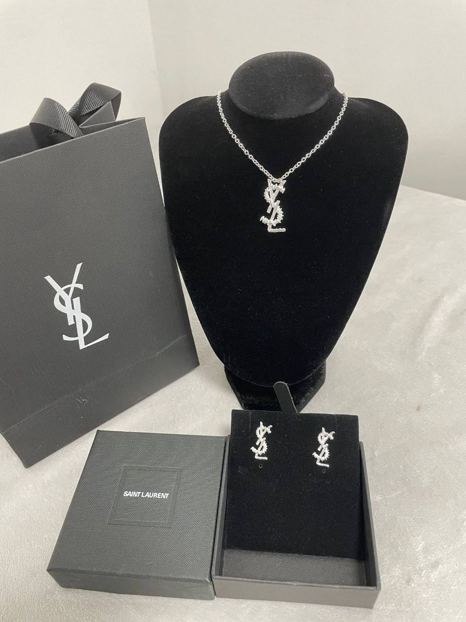 photo 5825510636492885707 y Saint Laurent YSL logo necklace earrings set silver AAA replica UK - women's designer reps sale