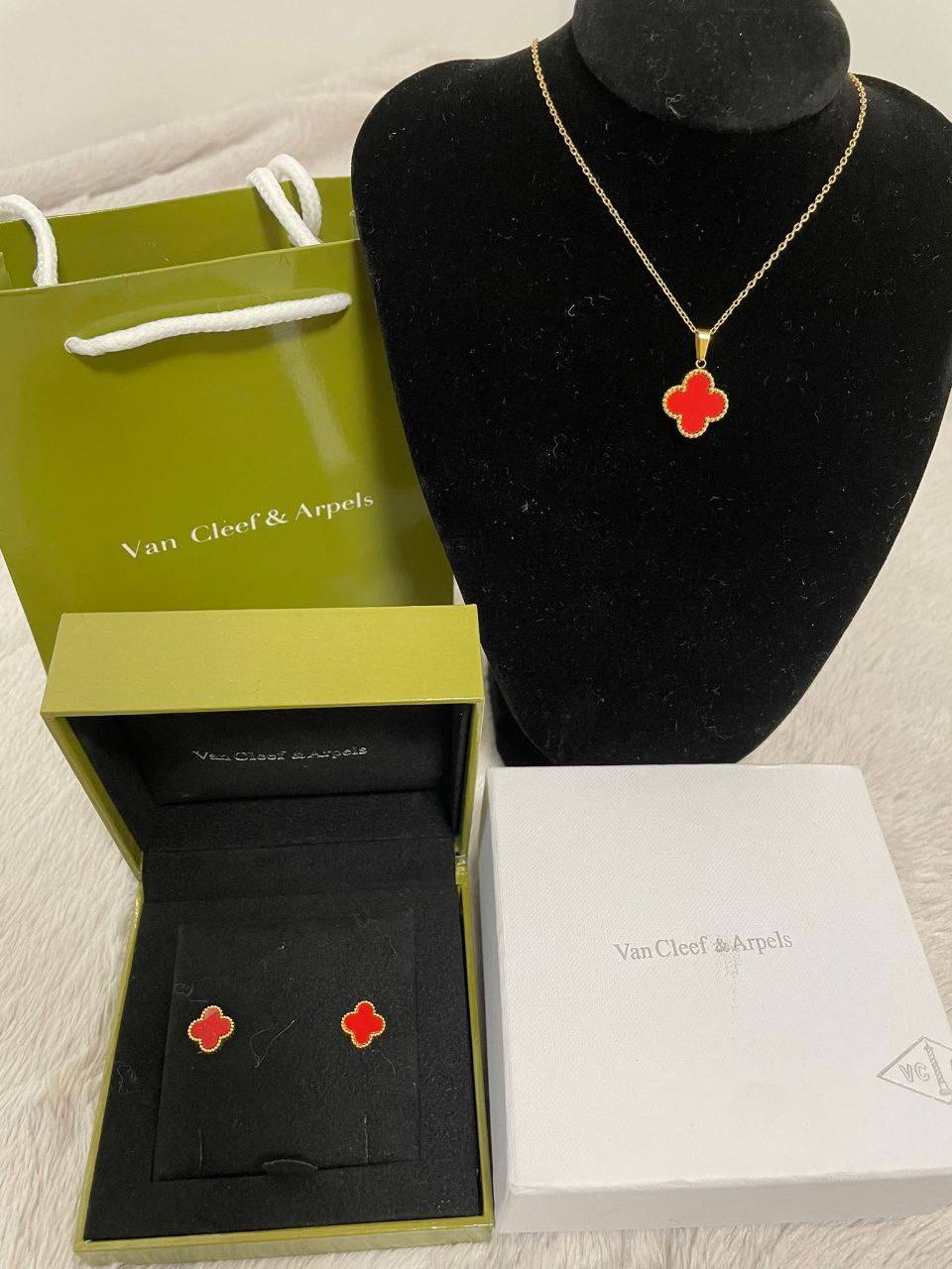 photo 5825510636492885709 y Van Cleef Arpels Alhambra Four Leaf Clover necklace earrings gold AAA replica UK - women's designer reps