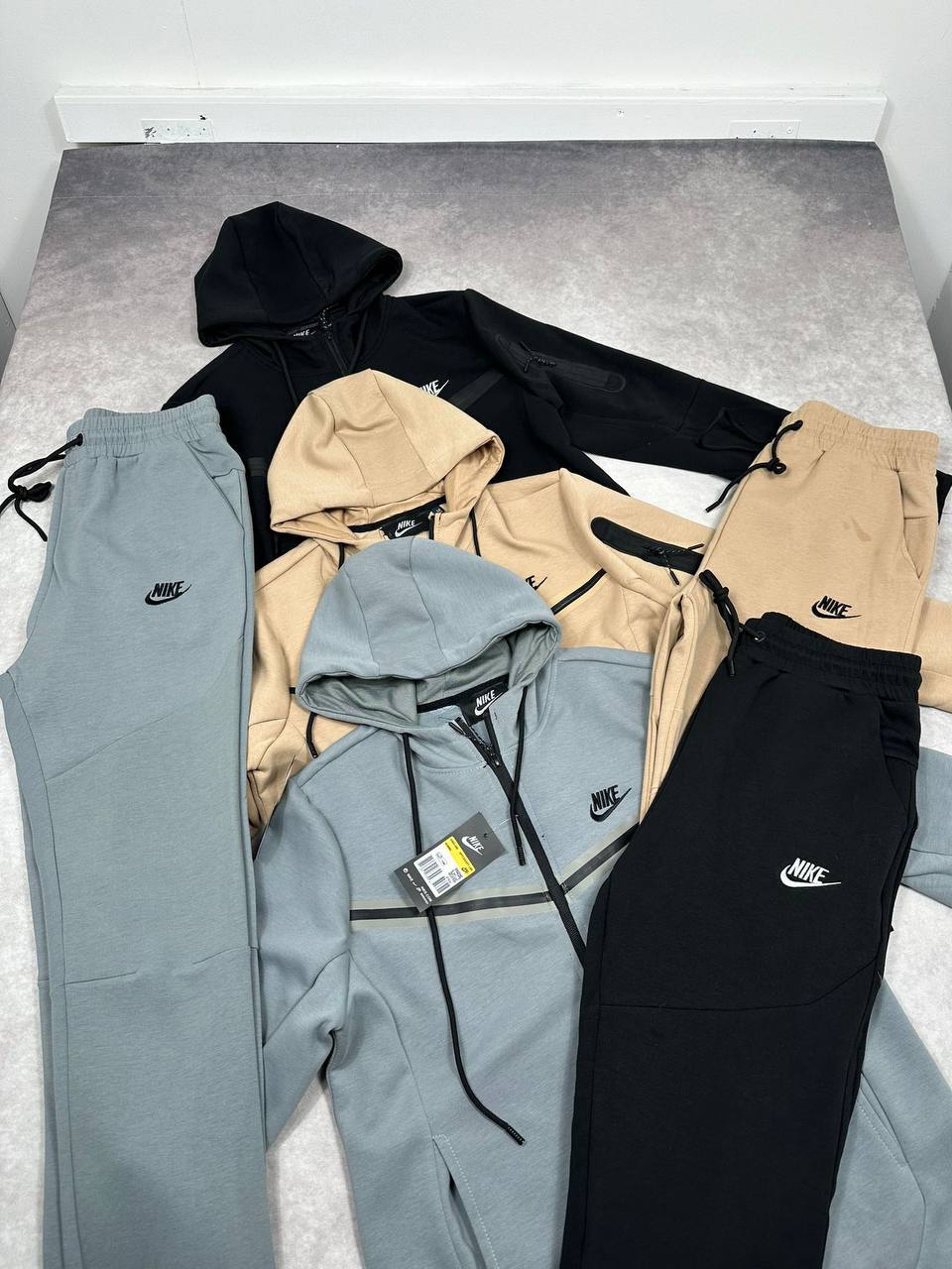 photo 5825880514781449354 y Nike Tech Fleece Windrunner tracksuit different colours men's AAA replica UK - designer reps sale