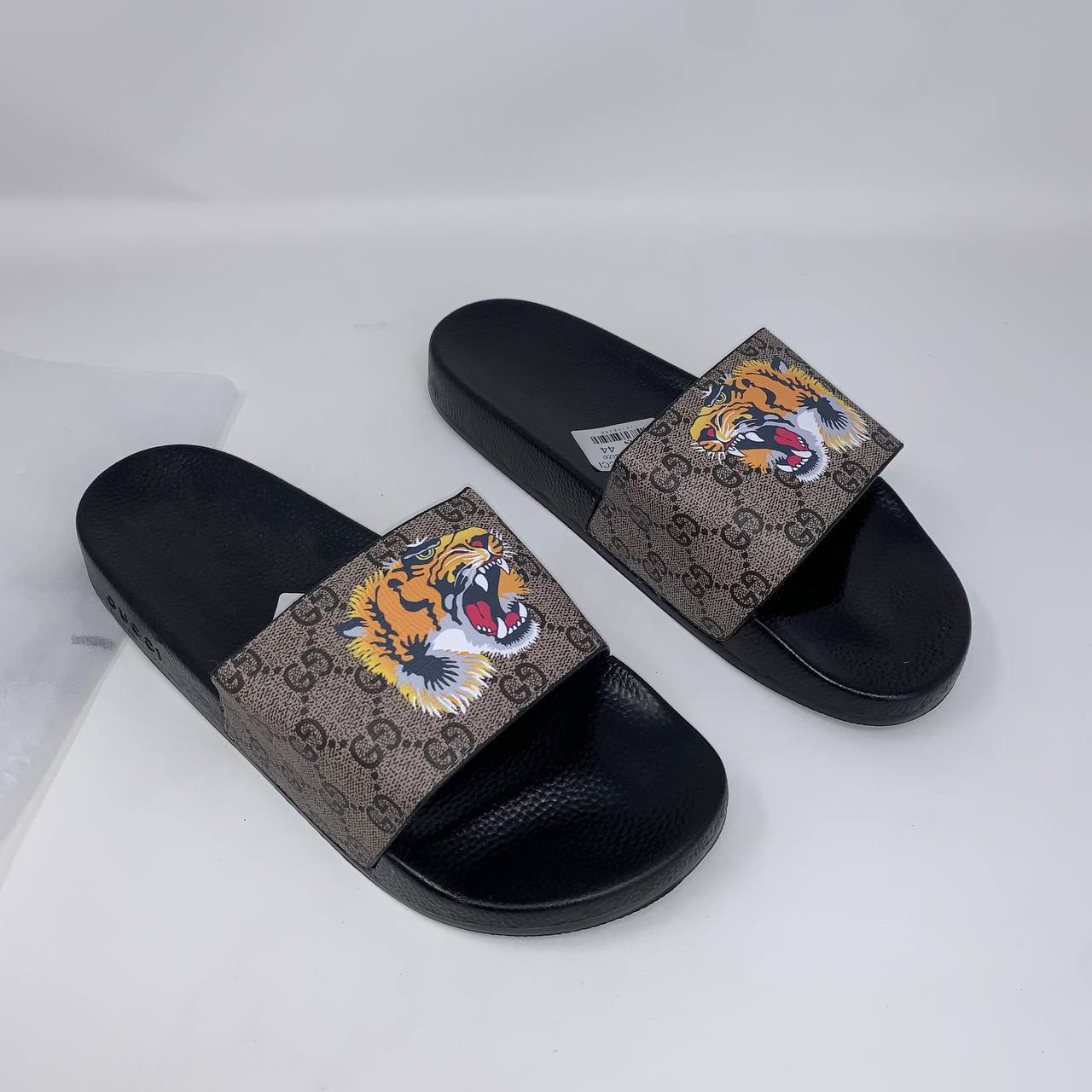 photo 5827762436306571333 y Gucci GG Supreme Tiger Pursuit sliders men's AAA replica UK - designer reps sale