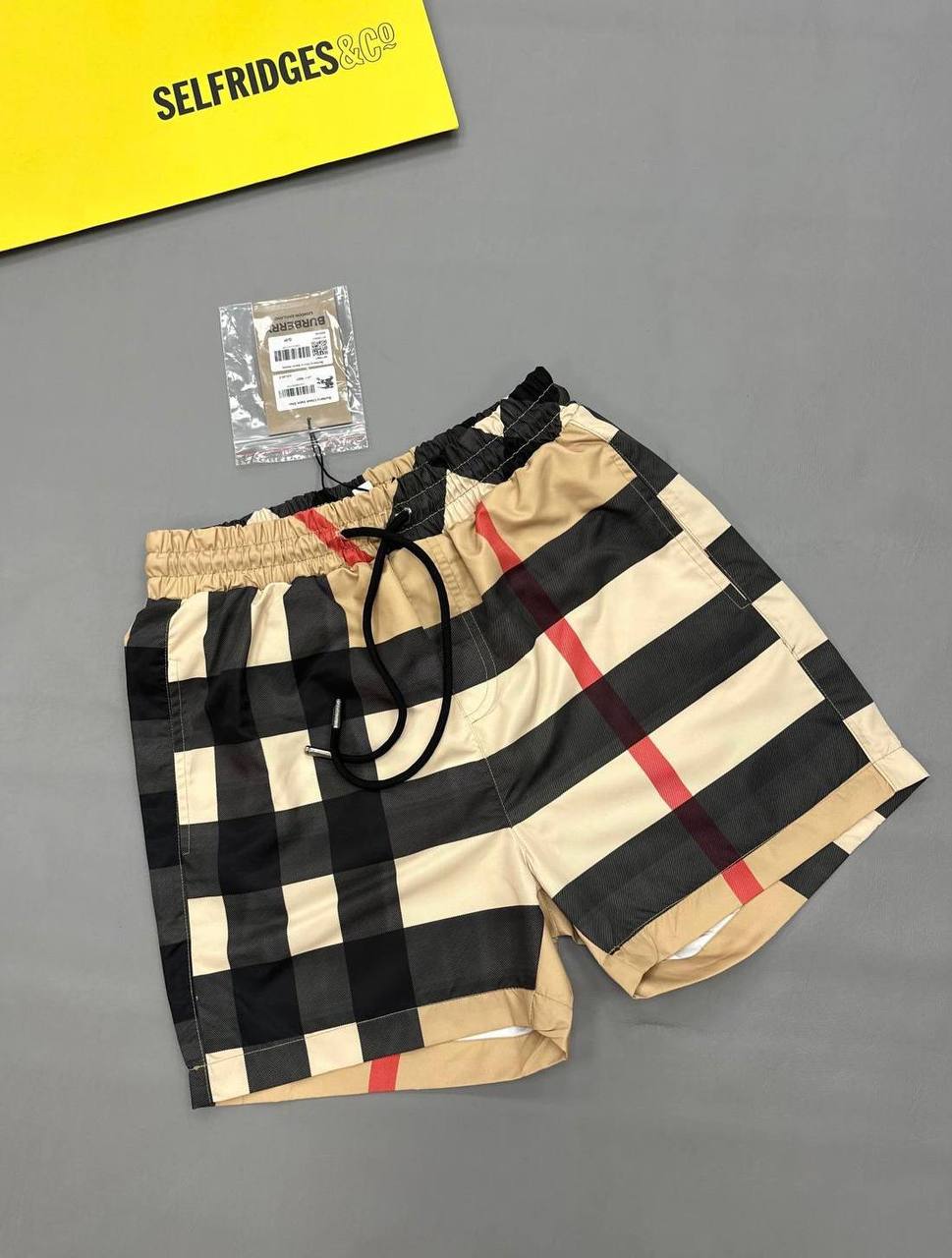 photo 5832710985955872835 y Burberry Oversized Check beige swim shorts men's AAA replica UK - designer reps sale