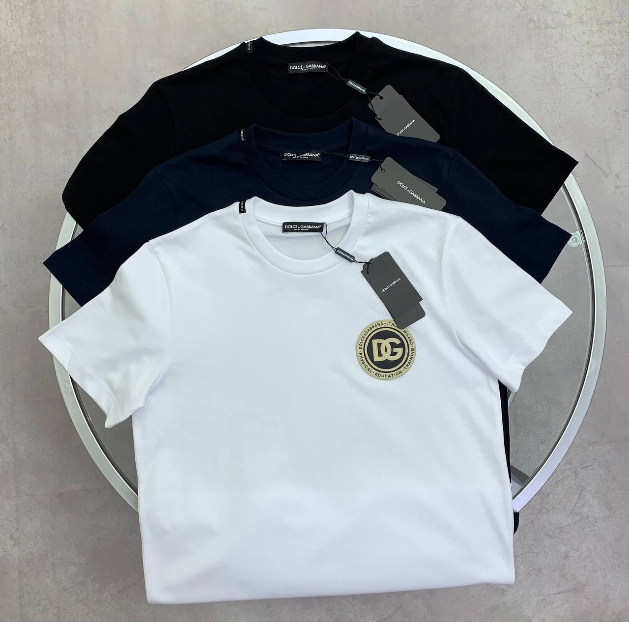 photo 5832710985955872885 y Dolce and Gabbana D&G Logo-Patch t-shirt different colours AAA replica UK - men's women's designer reps