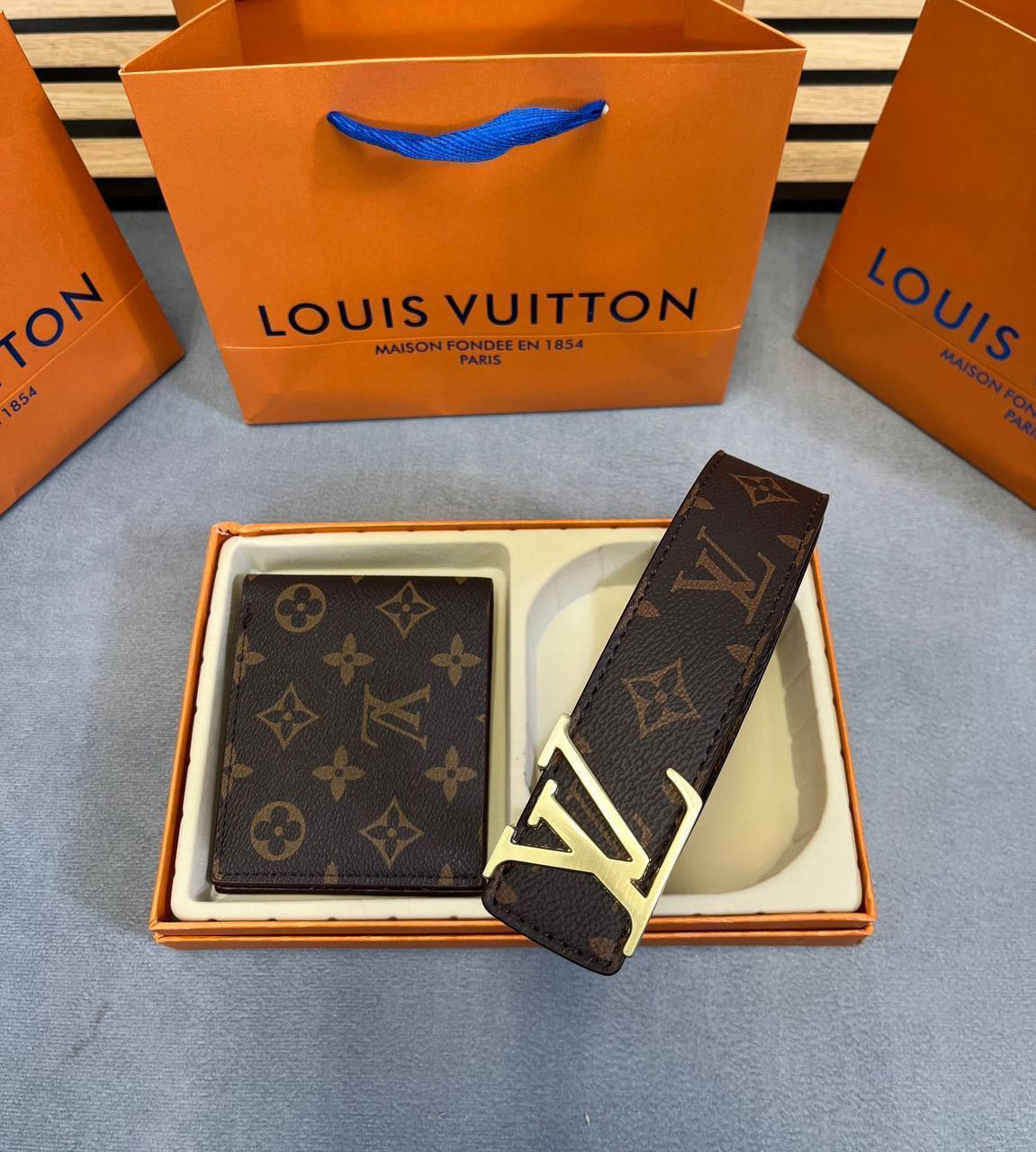 photo 5832710985955872951 y LV Damier Graphite Canvas Golden Buckle brown belt wallet set AAA replica UK - men's designer reps