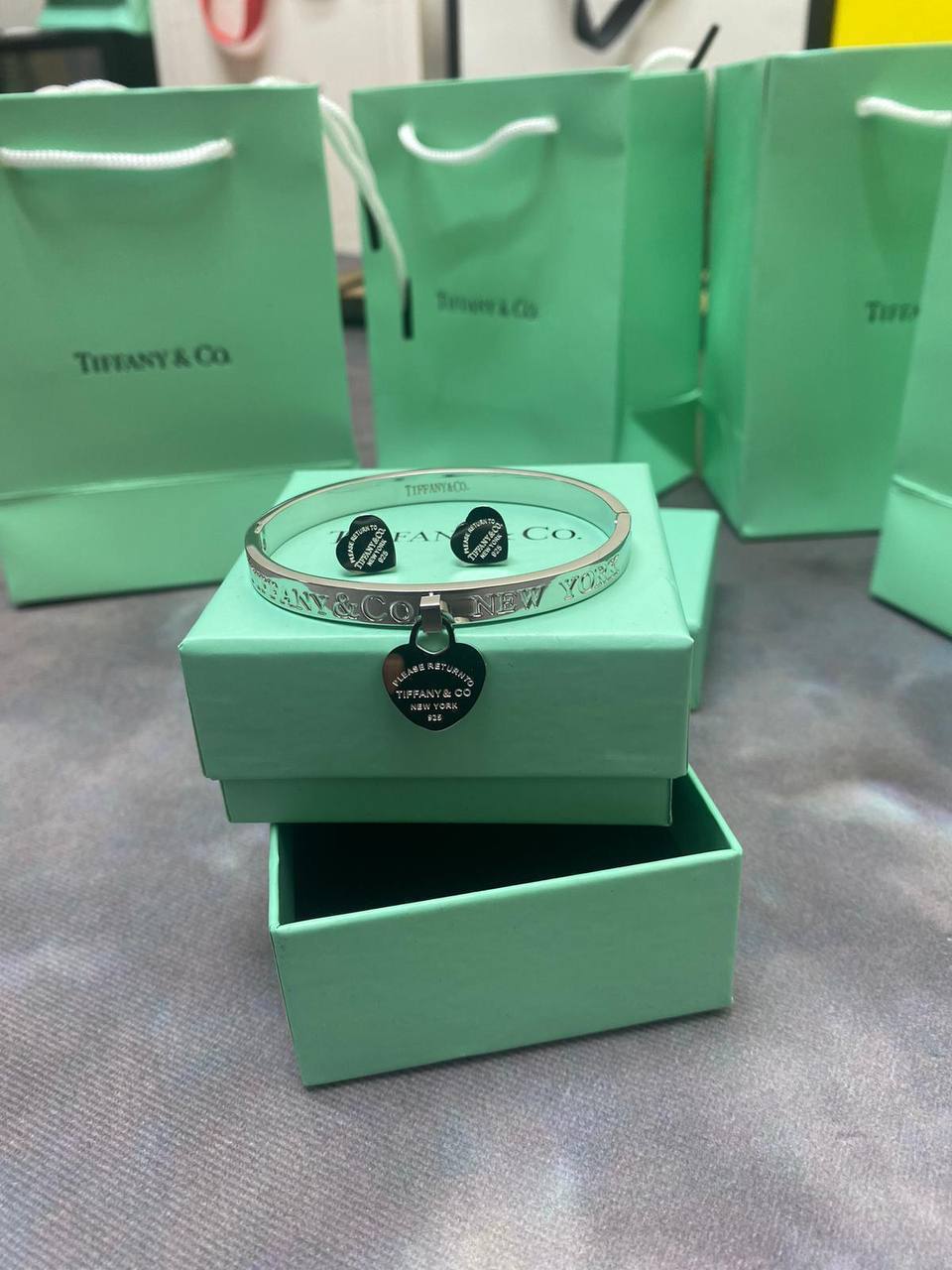 photo 5832710985955872955 y Tiffany and Co Heart Tag Hinged Silver bracelet earrings set AAA replica UK - women's designer reps