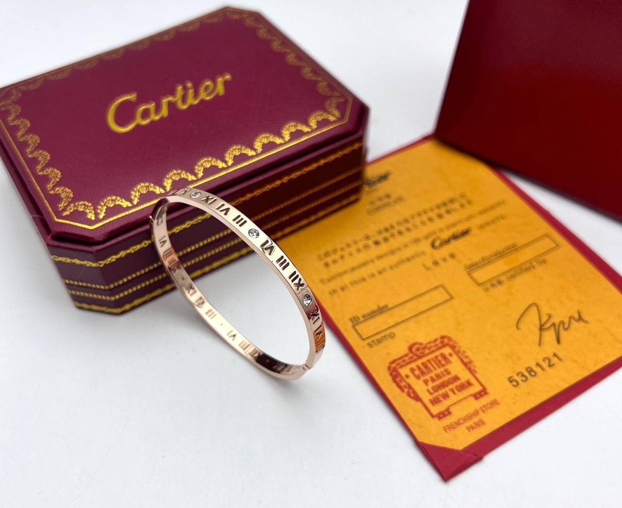 photo 5832710985955872975 y Cartier Roman Numeral inspired rose gold bracelet AAA replica UK - women's designer reps sale