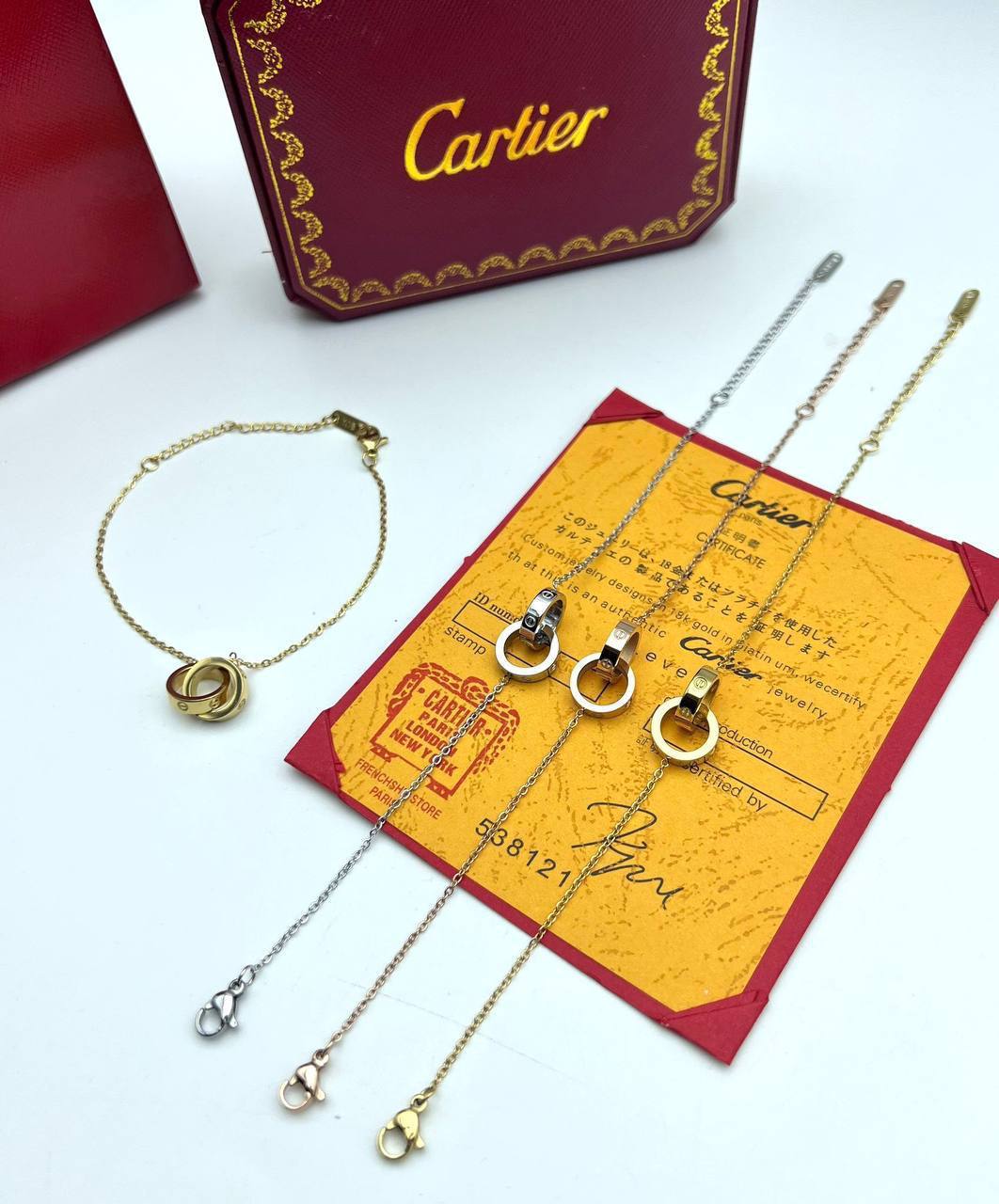 photo 5832710985955872976 y Cartier Trinity inspired cord chain bracelet different colours AAA replica UK - women's reps sale