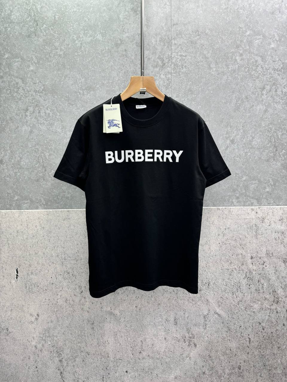 photo 5839087238568939001 y 1.jpg Burberry Block Lettering Logo Print Short Sleeve Men's Women's T-Shirts in 2 Colors Reps Sale UK Best Quality AAA Replica