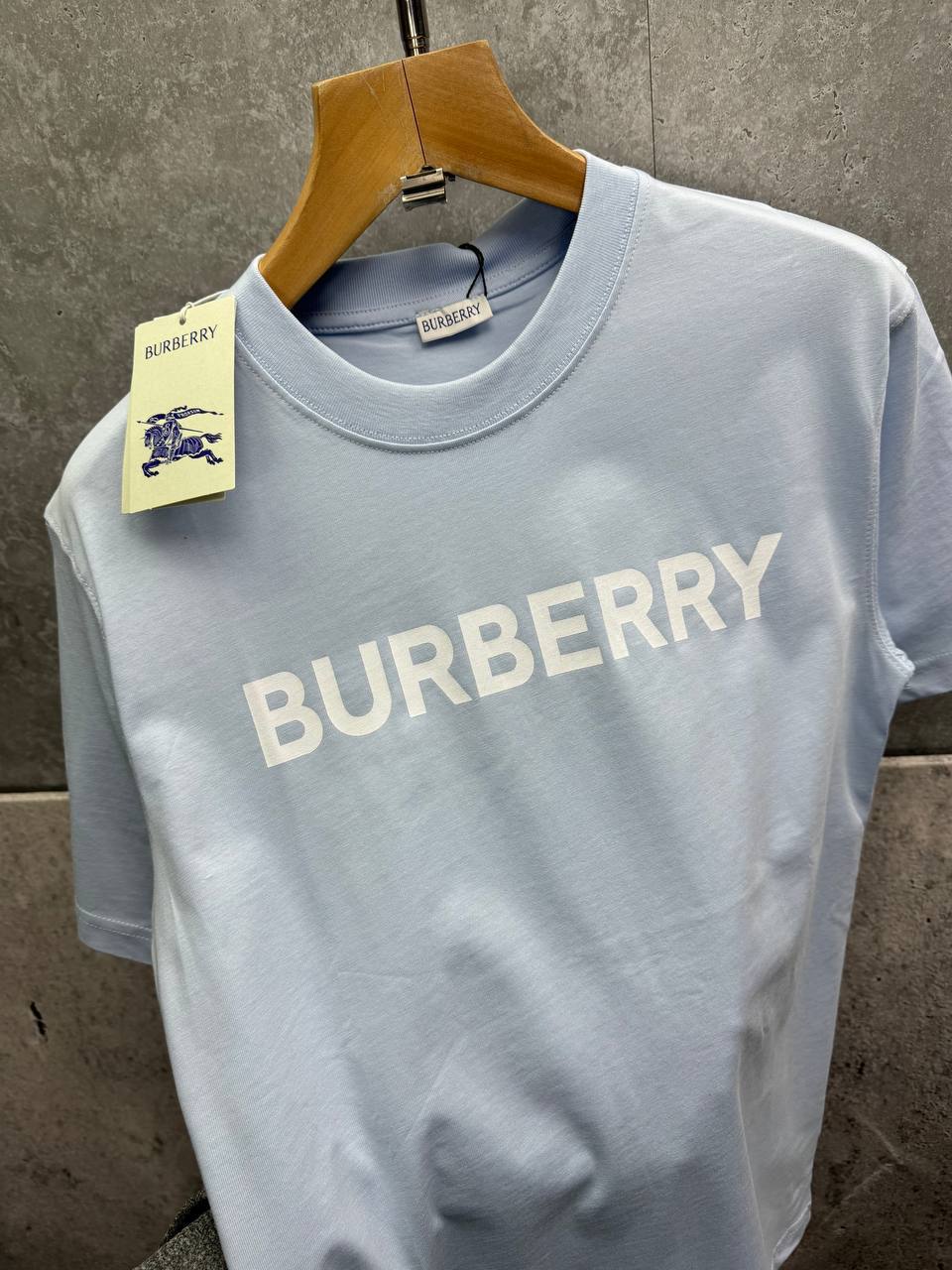 photo 5839087238568939011 y 1.jpg Burberry Block Lettering Logo Print Short Sleeve Men's Women's T-Shirts in 2 Colors Reps Sale UK Best Quality AAA Replica