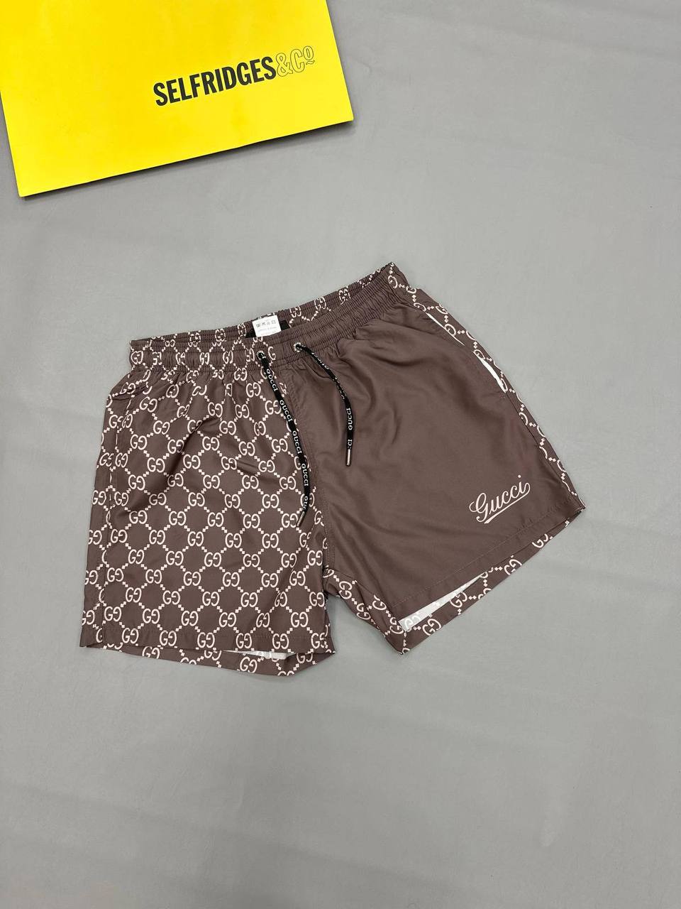 photo 5848330596600450358 y.jpg Gucci Split GG Monogram Print Swim Shorts in Brown Color Men's Reps Sale UK Best Quality AAA Replica
