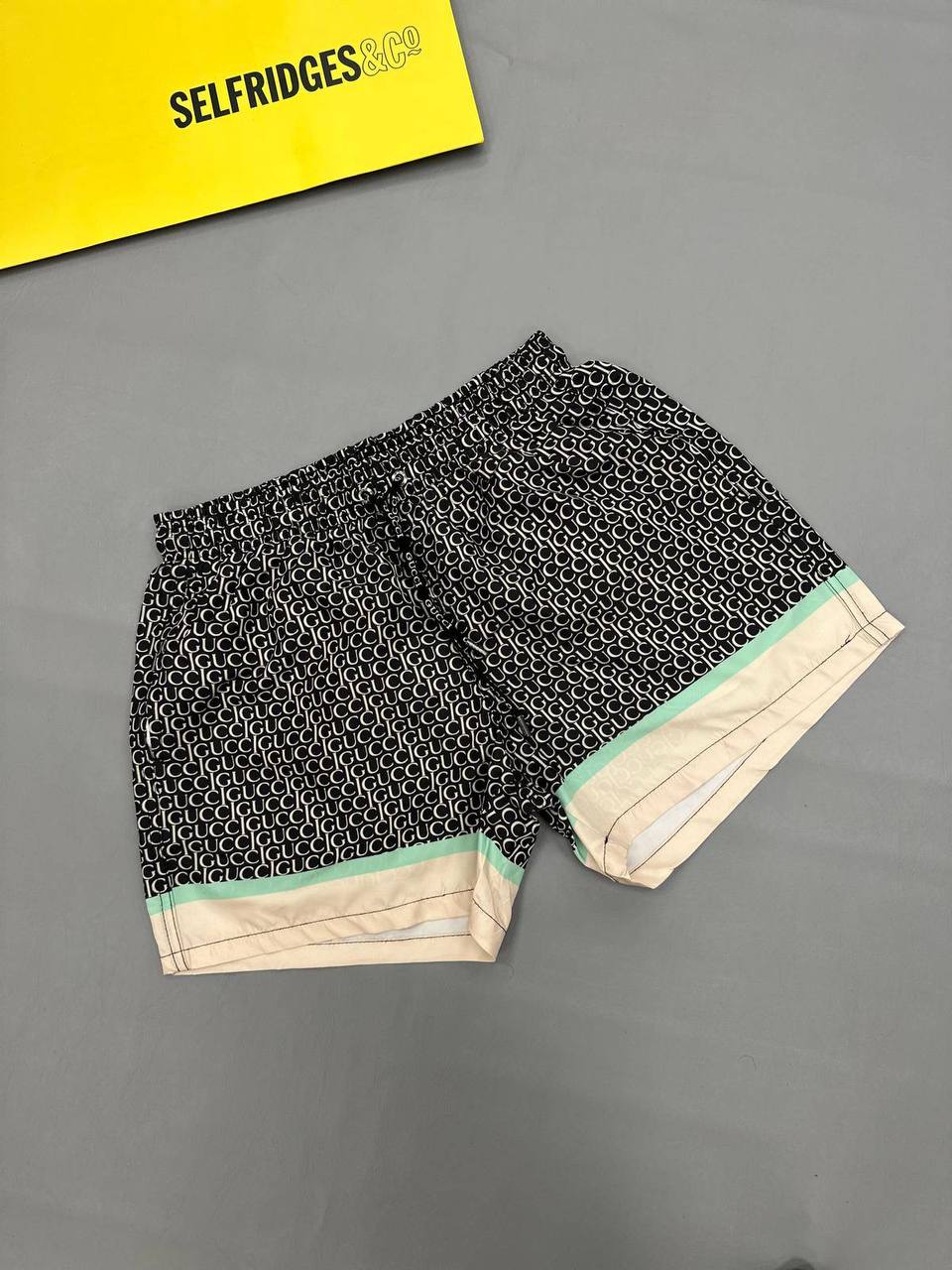 photo 5848330596600450384 y 1.jpg Gucci Allover Geometric Monogram Swim Shorts in Black/Beige Color Men's Reps Sale UK Best Quality AAA Replica