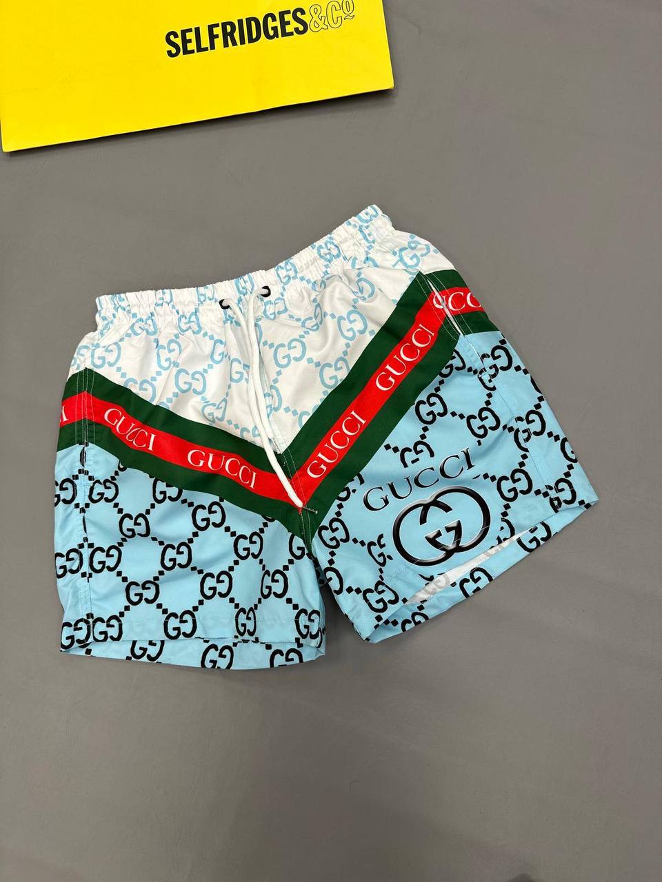 photo 5848330596600450390 y 1.jpg Gucci Diagonal Web Stripe Monogram Swim Shorts Men's Reps Sale UK Best Quality AAA Replica