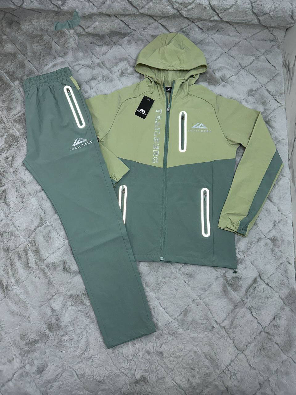 photo 5848330596600450475 y.jpg Trailberg AW24 Triathlon Tracksuit Green Tracksuit Men's Reps Sale UK Best Quality AAA Replica