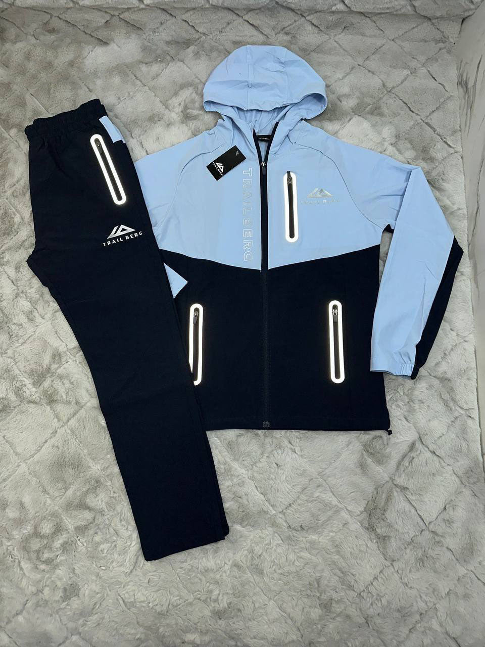 photo 5848330596600450476 y.jpg Trailberg AW24 Triathlon Tracksuit Light Blue/Black Tracksuit Men's Reps Sale UK Best Quality AAA Replica