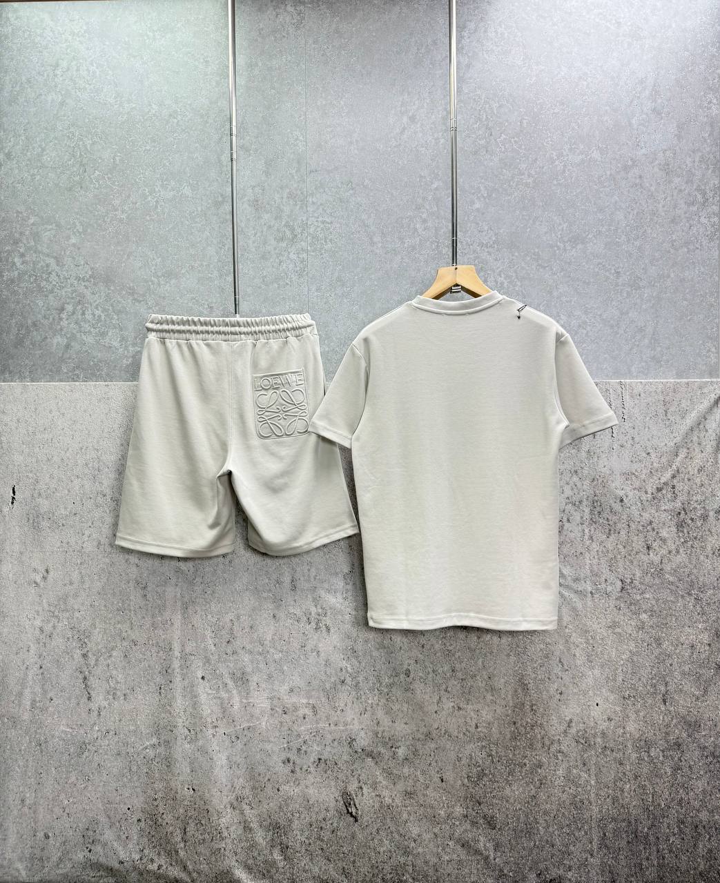 photo 5848330596600450531 y.jpg Loewe Relaxed Fit Anagram Embroidery Pocket Short Sleeve T-Shirts & Shorts Set in White Color Men's Reps Sale UK Best Quality AAA Replica