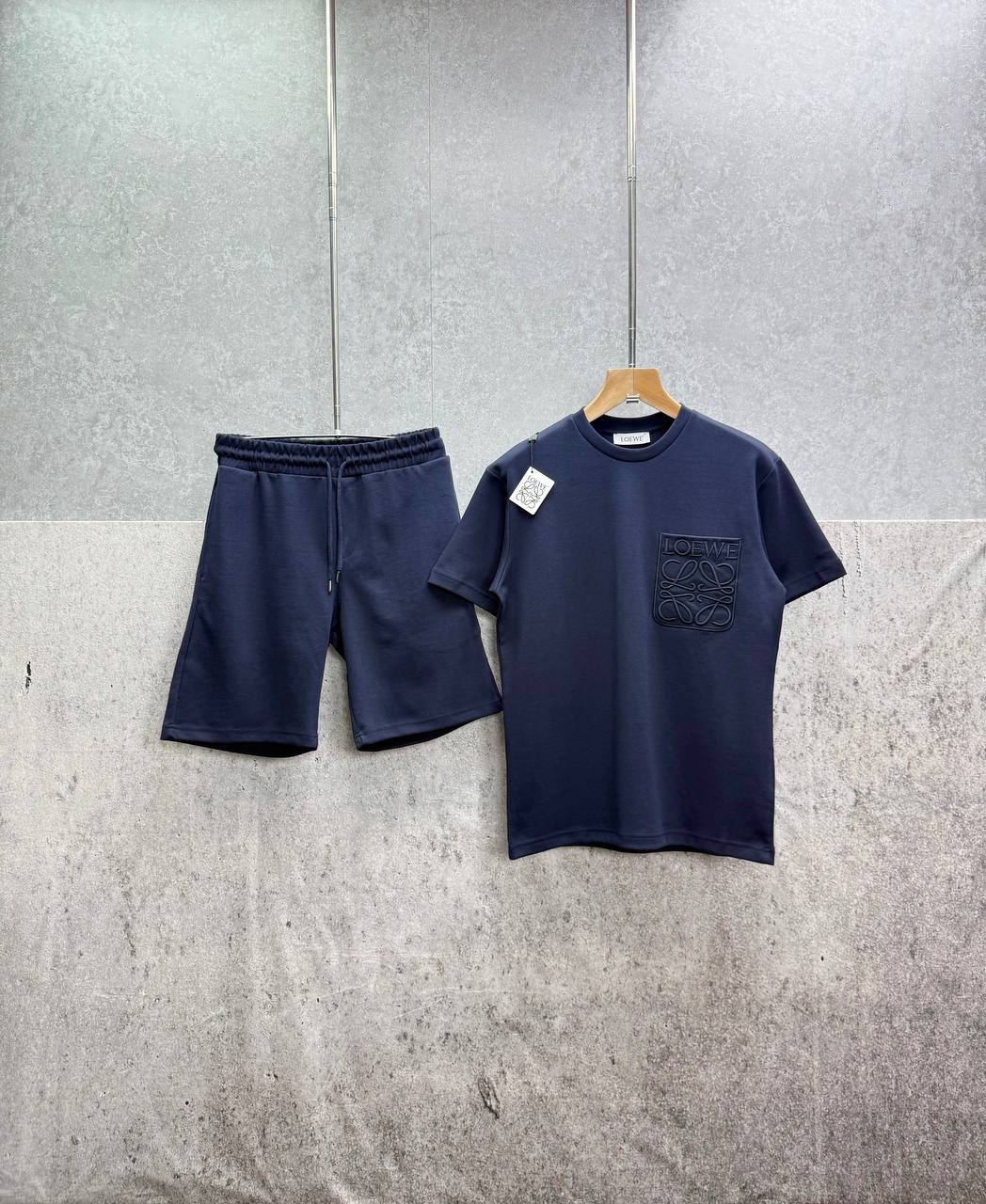 photo 5848330596600450533 y.jpg Loewe Relaxed Fit Anagram Embroidery Pocket Short Sleeve T-Shirts & Shorts Set in Navy Blue Color Men's Reps Sale UK Best Quality AAA Replica