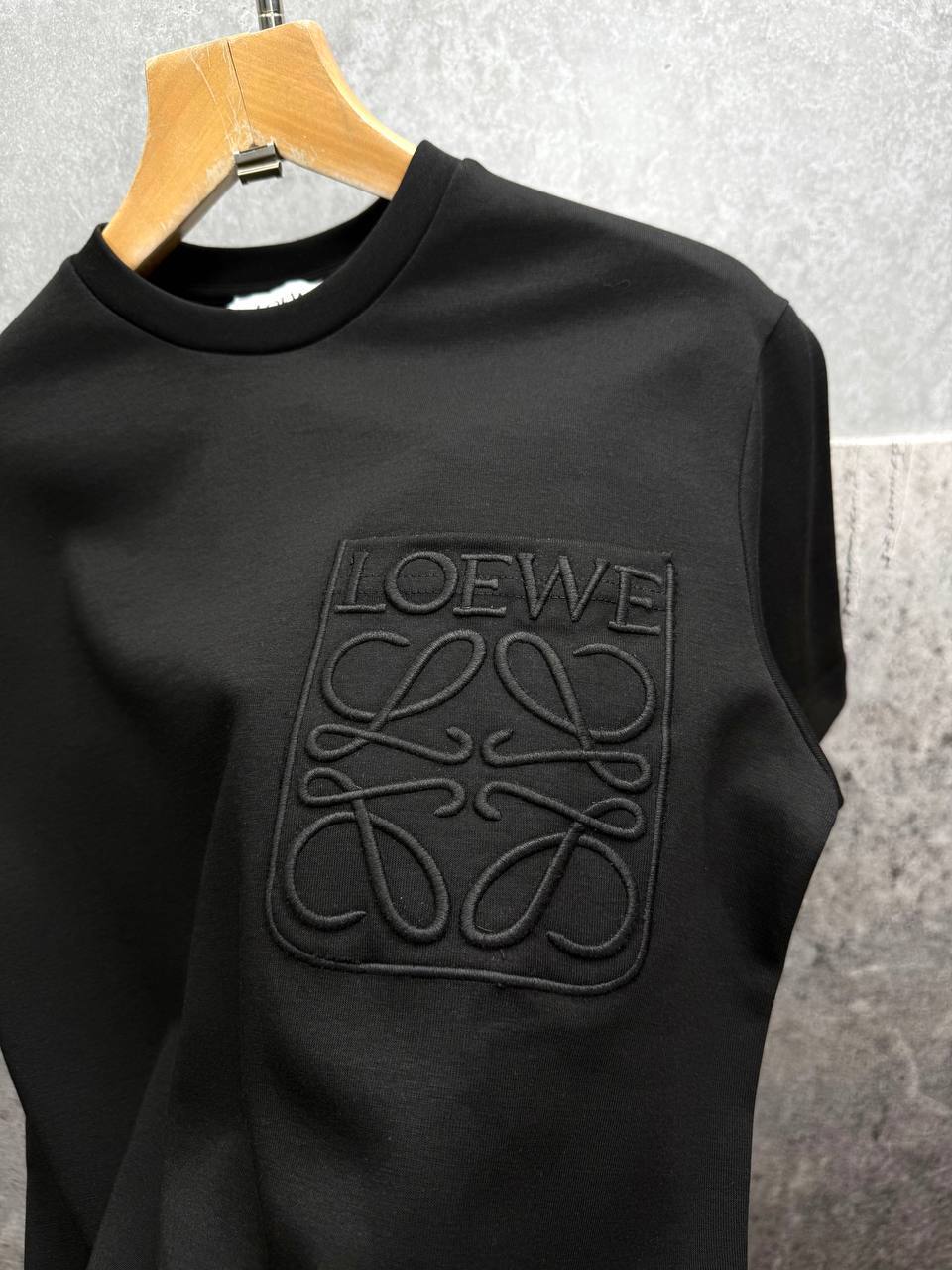 photo 5848330596600450538 y.jpg Loewe Relaxed Fit Anagram Embroidery Pocket Short Sleeve T-Shirts & Shorts Set in Black Color Men's Reps Sale UK Best Quality AAA Replica