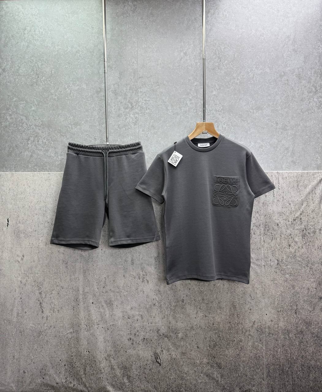 photo 5848330596600450539 y.jpg Loewe Relaxed Fit Anagram Embroidery Pocket Short Sleeve T-Shirts & Shorts Set in Grey Color Men's Reps Sale UK Best Quality AAA Replica
