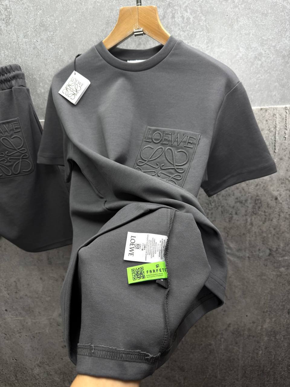 photo 5848330596600450541 y.jpg Loewe Relaxed Fit Anagram Embroidery Pocket Short Sleeve T-Shirts & Shorts Set in Grey Color Men's Reps Sale UK Best Quality AAA Replica