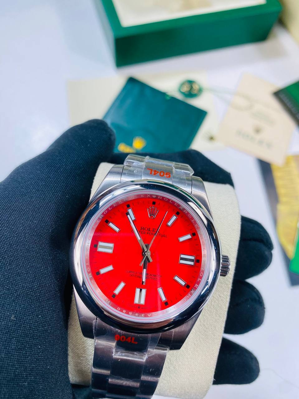 photo 5940325089523994275 y.jpg Rolex Oyster Perpetual 124300 Men's Watch Coral Red Dial Reps Sale UK Best Quality AAA Replica