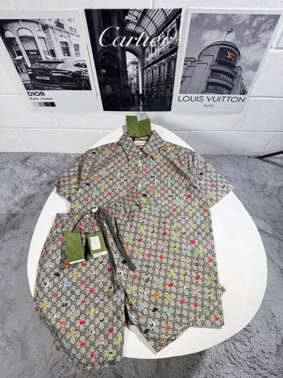 photo 5940325089523994318 y.jpg Gucci GG Supreme Canvas Face Print Short-Sleeve Shirt and Shorts Set Reps UK Best Quality Sale AAA Replica